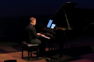 Geoffrey Burleson playing piano