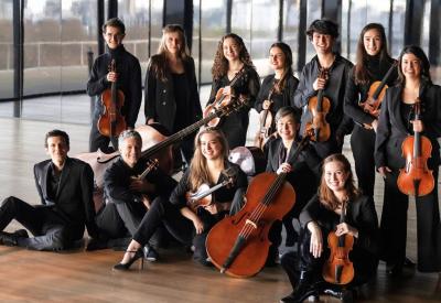 Les Arts Florissants pose with their instruments 