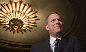 David Gockley with the Opera House chandelier as a halo Photo by Michael Winoku