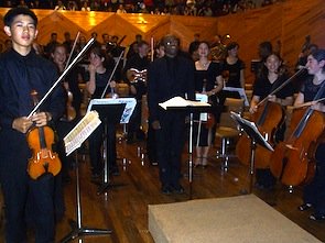 The Oakland Youth Orchestra and Morgan take a bow